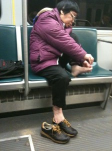 clipping-toenails-on-the-subway